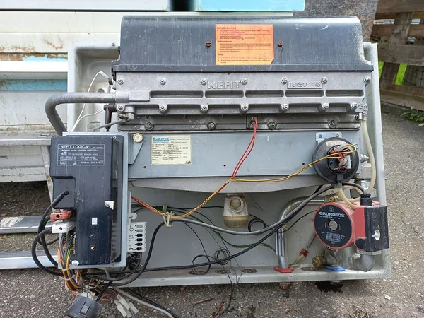 Gas engineer servicing a home boiler