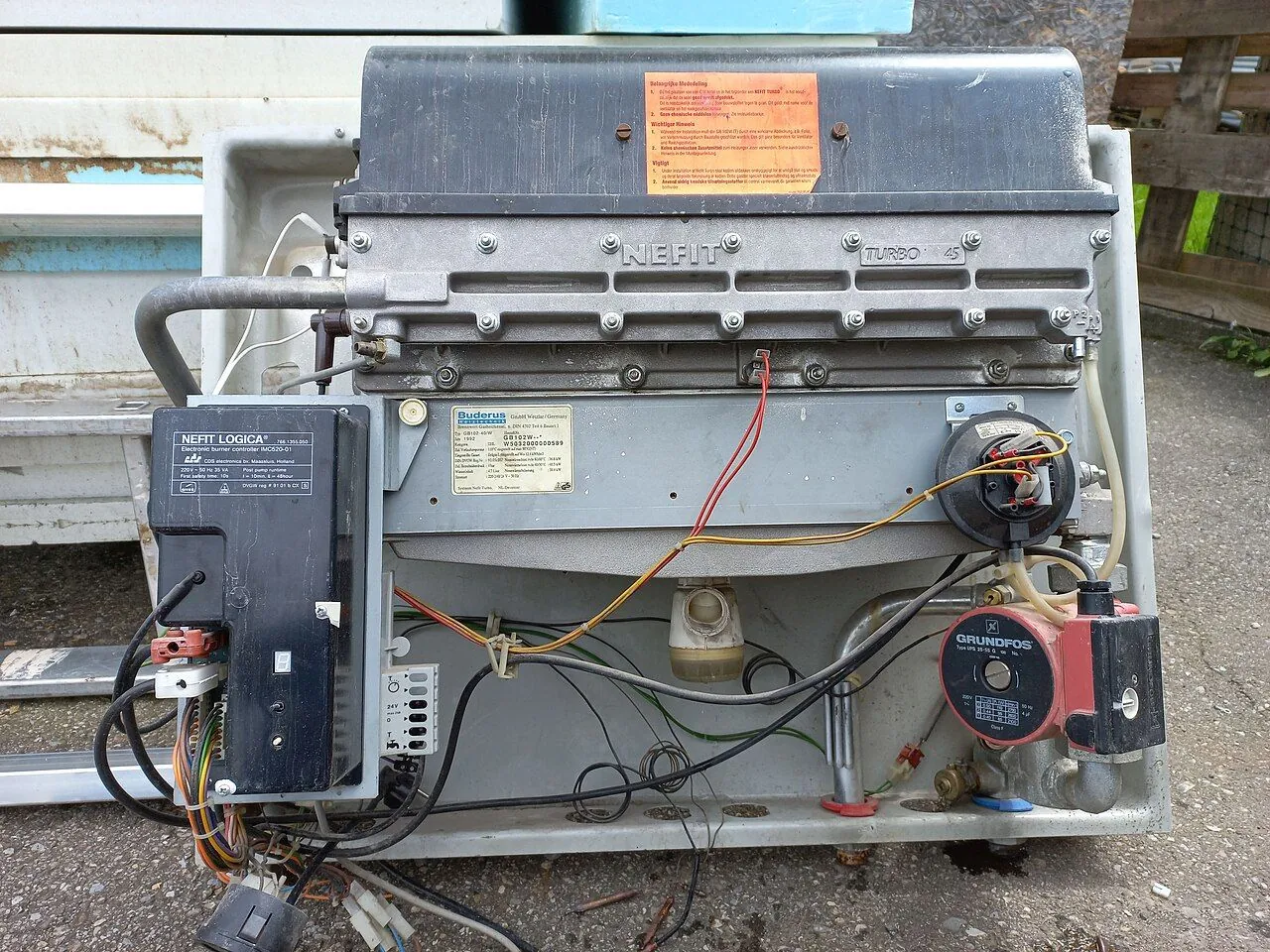 Gas engineer servicing a home boiler