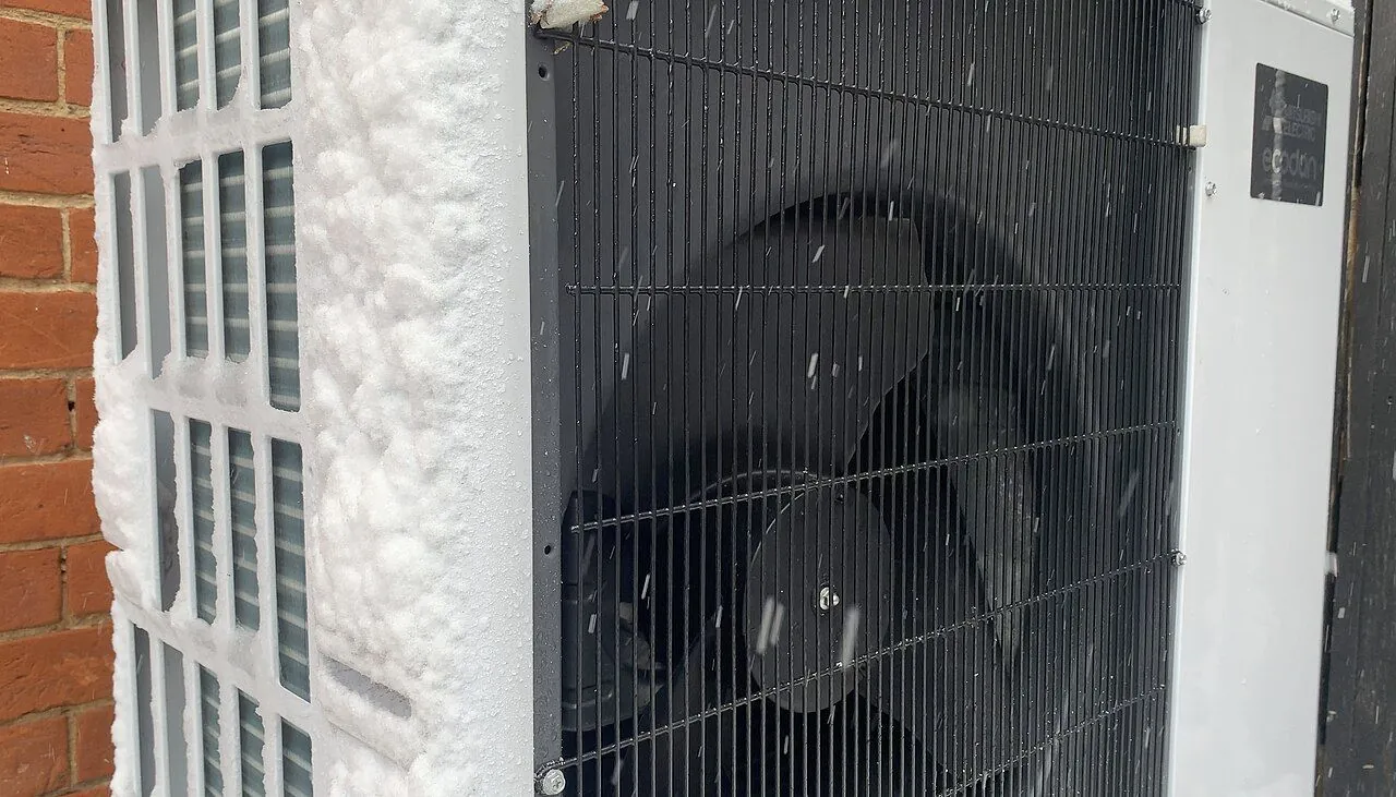 heat pump unit installed outside a house
